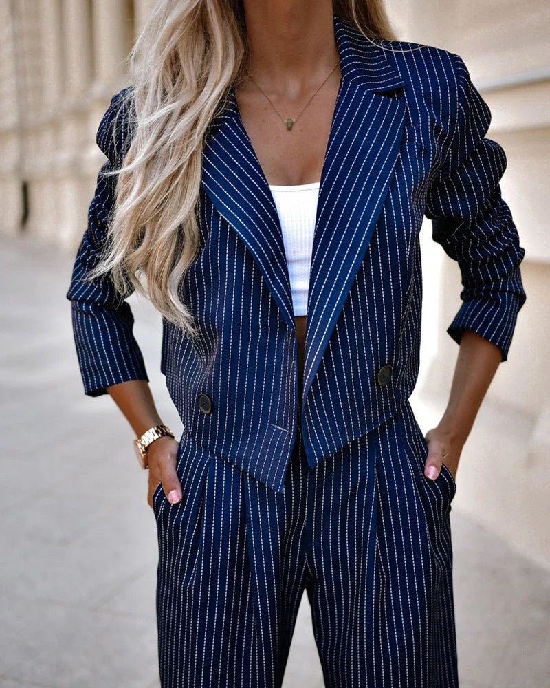 Stylish striped casual suit with cropped top and straight-leg pants in gray, dark blue, and black colors