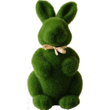 Realistic moss-covered Easter bunny decoration made from lightweight foam and artificial grass