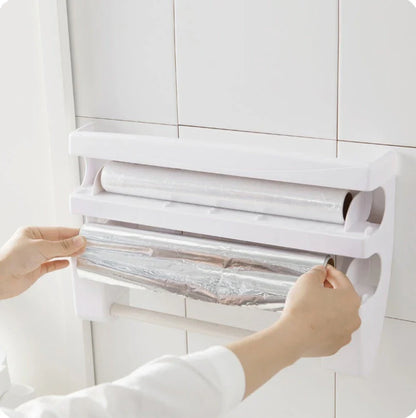 Versatile wall-mounted kitchen storage dispenser with cling film, foil, and paper towel cutting tools