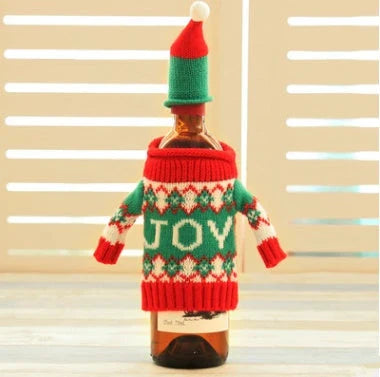 Knitted Christmas Bottle Set with festive designs including Joy, Christmas tree, elk, and snowman