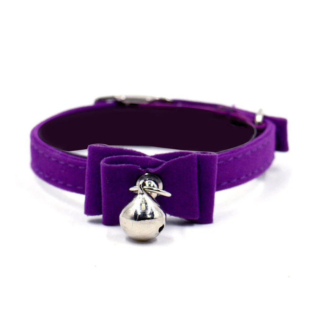 Stylish dog collar with bow tie and bell in various colors, perfect for New Zealand pet owners