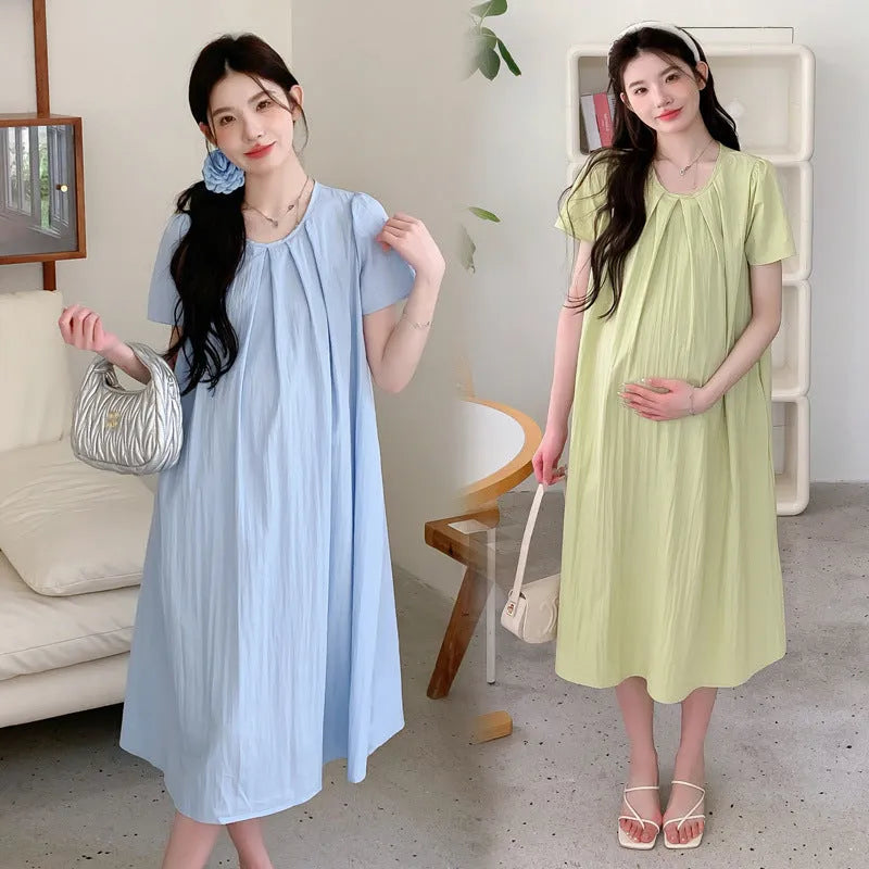 Loose summer maternity dress in sky blue with petal sleeves and nine-quarter length sleeves, street fashion style