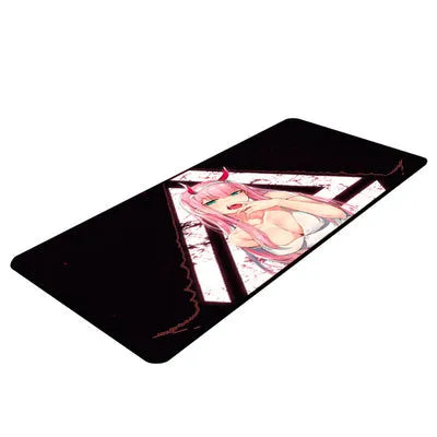 Pink Darling anime cloth keyboard mat on a desk with a mouse and keyboard