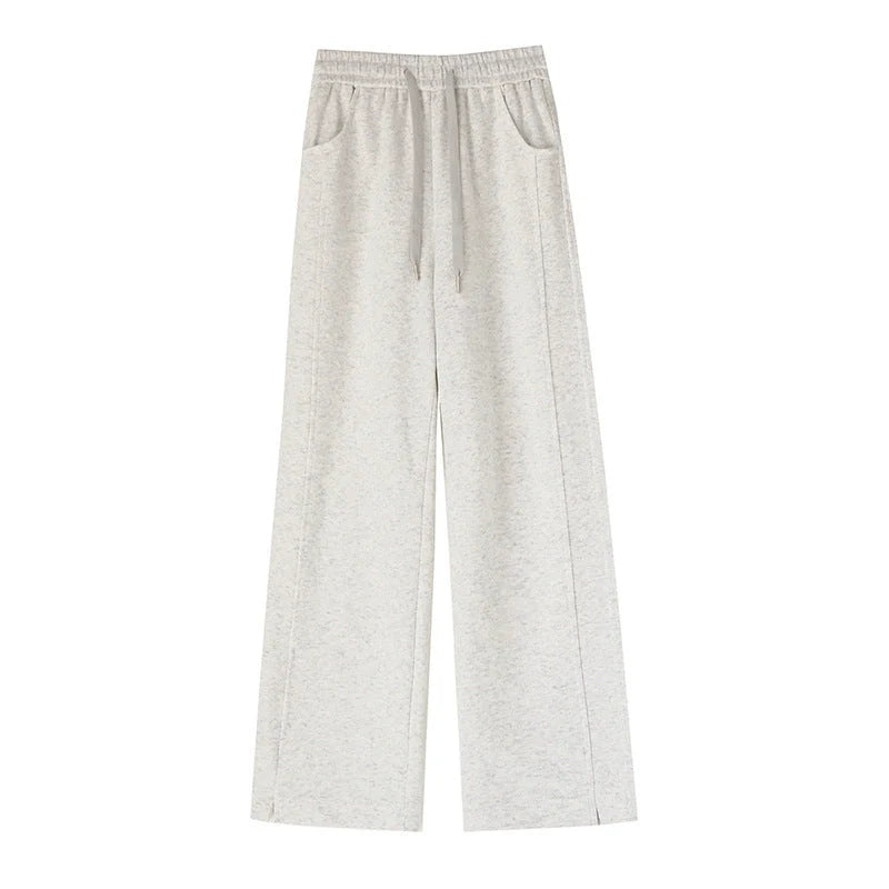 Women's high waist cotton sweatpants in various colours, featuring a straight-leg design and pockets.
