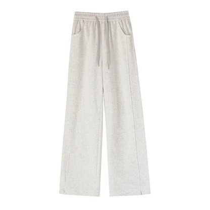 Women's high waist cotton sweatpants in various colours, featuring a straight-leg design and pockets.