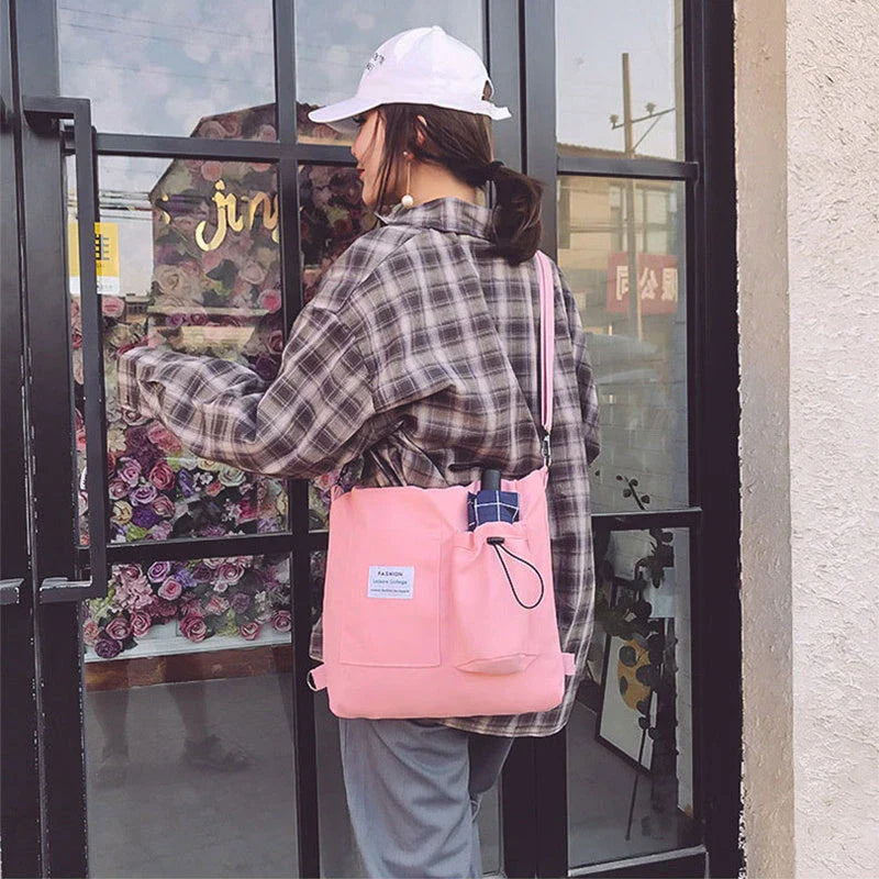 Harajuku-style canvas backpack with pockets, preppy design, and variety of color options for college students