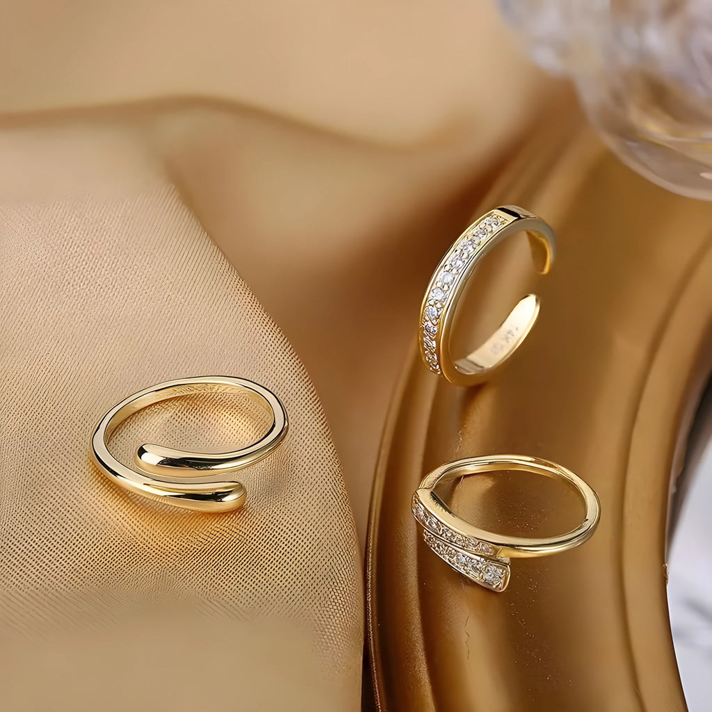 Geometric toe ring with gold plating in rhinestone and water drop designs