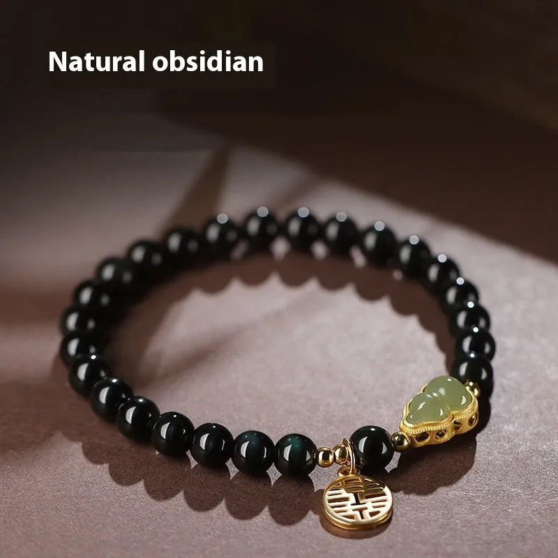 Black obsidian and white Hetian jade gourd bracelet with geometric pattern in 6mm, 8mm, and 10mm size options.