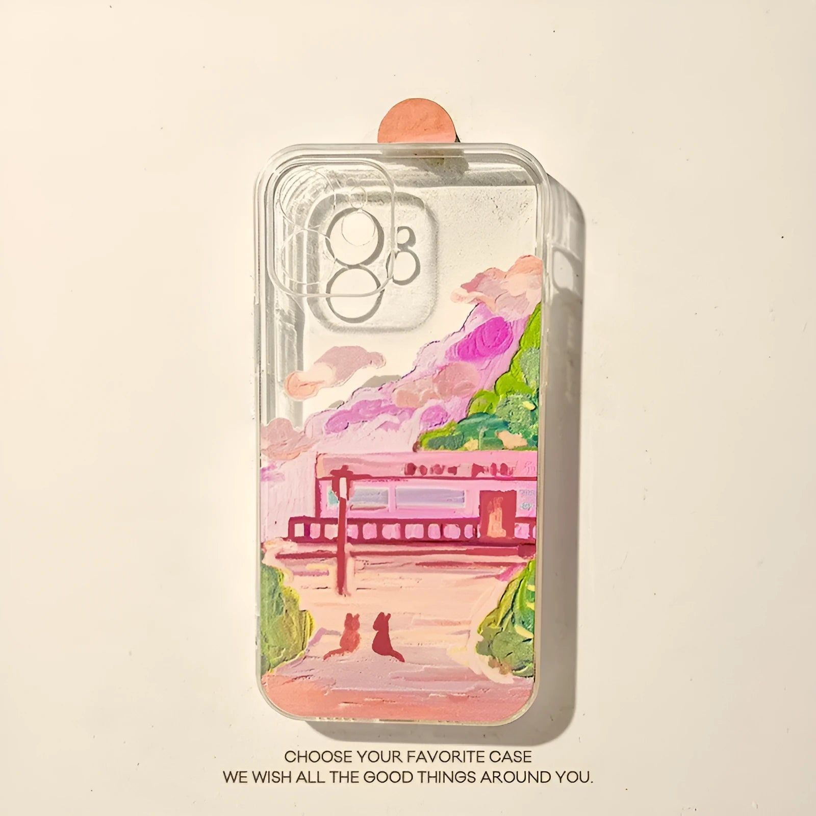 Colourful soft silicone iPhone case with a printed cartoon design of two cats.