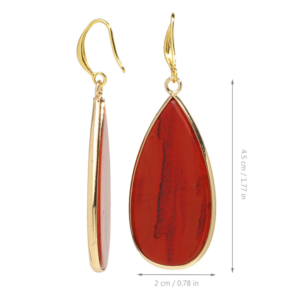 Vintage Tigereye long water drop stone earrings showing textured surface and elongated silhouette