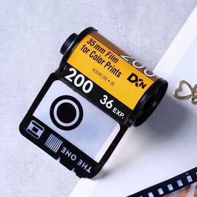 Kodak yellow wooden box film album with tote bag and gifts for photo storage.