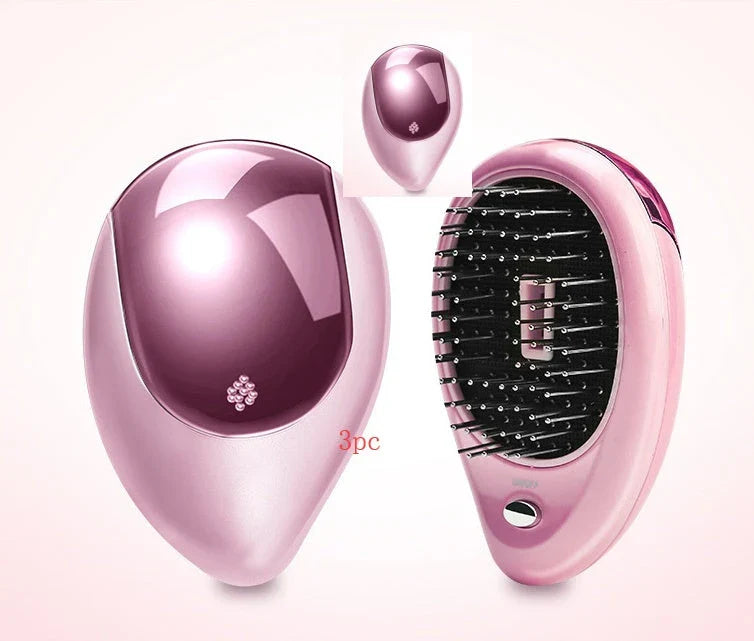 Portable negative ion hair comb with sound wave vibration technology in pink and green