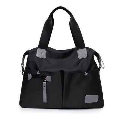 Ladies shoulder bag in black Oxford fabric, size M with multiple pockets and adjustable straps for handbag or crossbody carry, 340 mm width