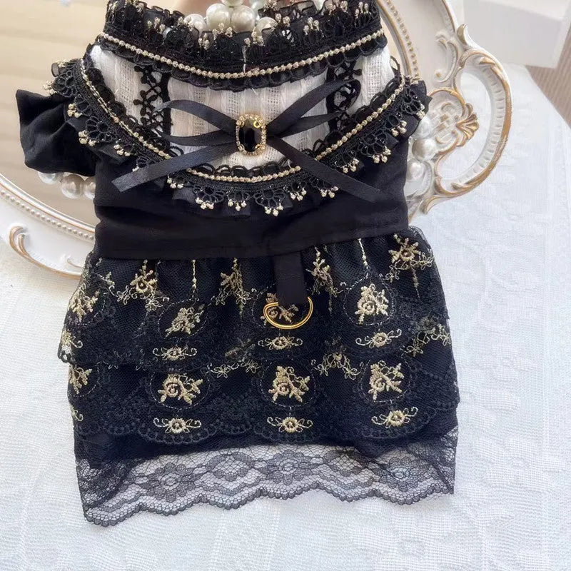 Golden gothic princess skirt costume for a small dog on a white background.