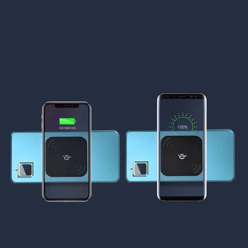 Black alloy power bank with LCD display showing battery percentage, next to a smartphone.
