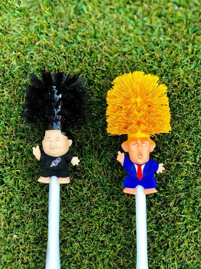 Bright yellow Trump-themed toilet brush with hanging slot