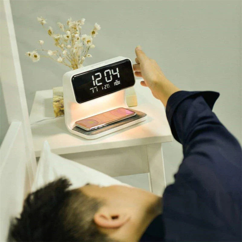 Wireless charging bedside lamp with alarm clock and phone charging capabilities