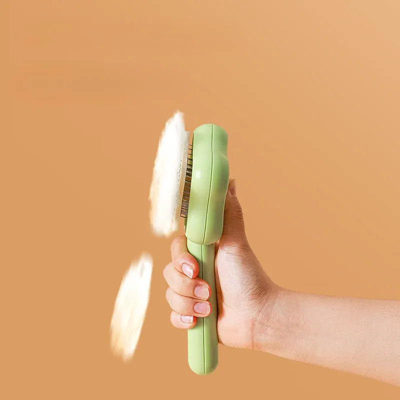 Green stainless steel cat grooming comb with four different needle surfaces for pet hair removal