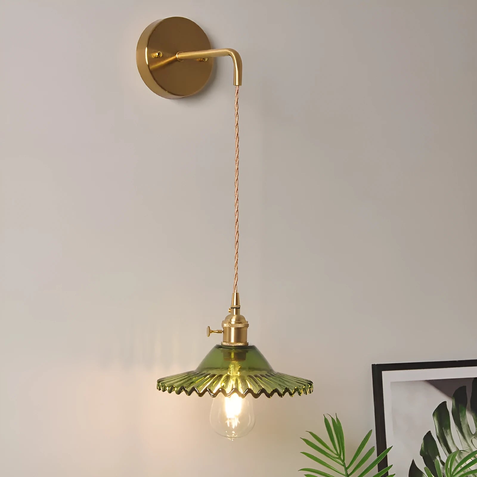 Retro copper lotus wall lamp with glass shade in choice of six colours on a wall.