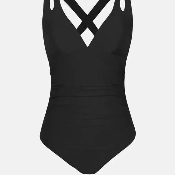 Solid colour one-piece swimsuit with triangle bikini top and cross shoulder straps.