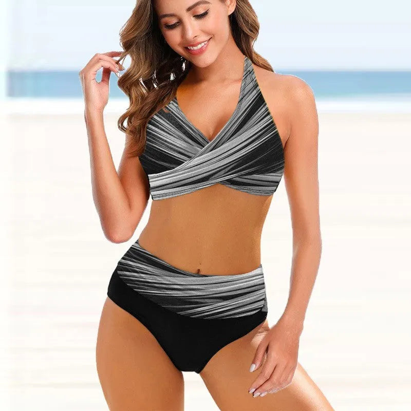 Women's striped tie-dye bikini set with hollow design detail, high-waisted bottoms, and backless top.