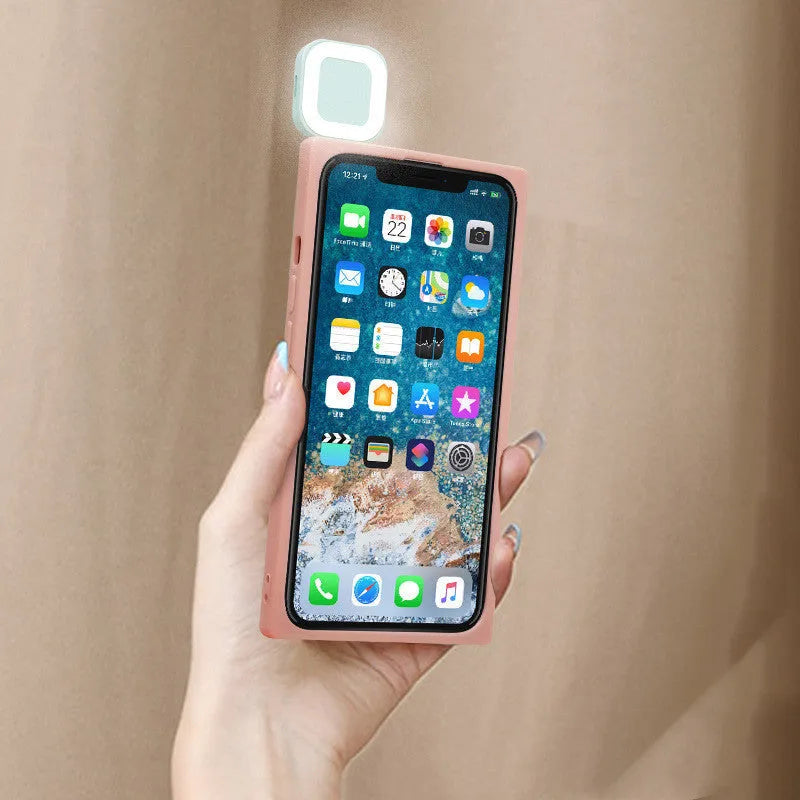 Ring flashing mobile phone case for iPhone 13 in solid colour with integrated selfie light.