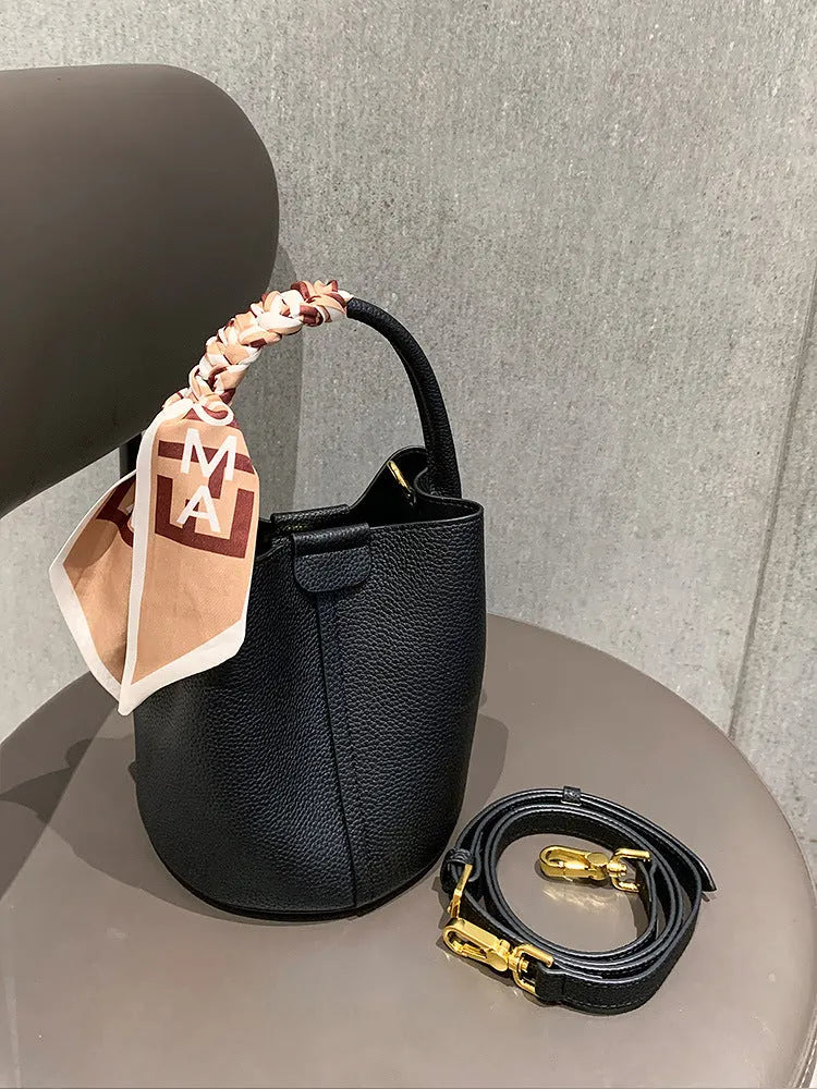 PU leather casual handbag for women with bow detail in golden brown