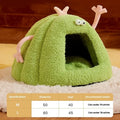 Monster-shaped semi-enclosed cat kennel bed in green, purple or yellow with soft velvet lining.