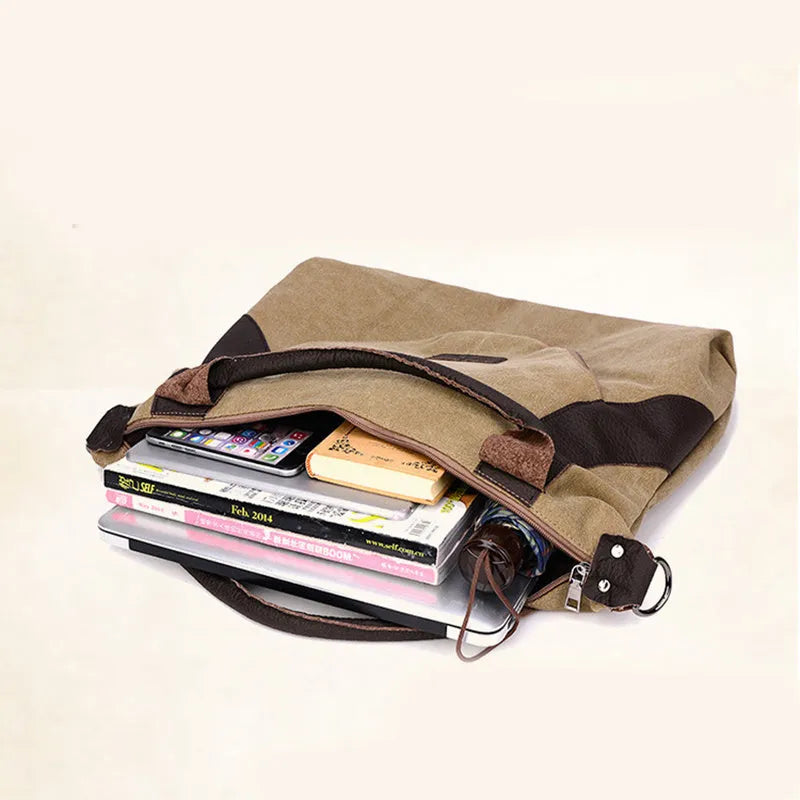 Women's canvas handbag in lake blue with zipper closure, hard handle, and double strap roots for shoulder or crossbody carry