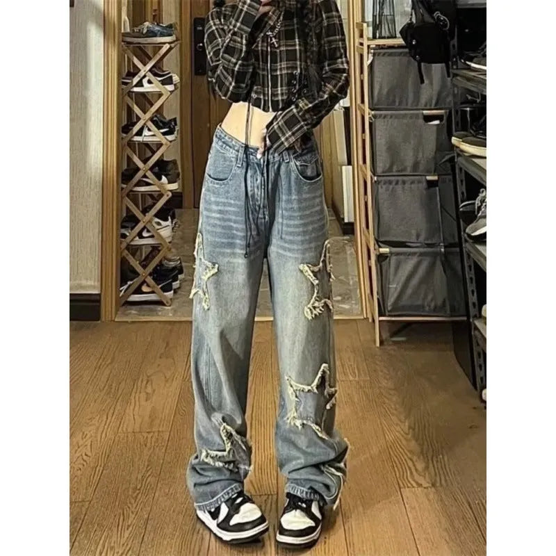 Blue high-waist wide-leg denim jeans with straight cut on hanger