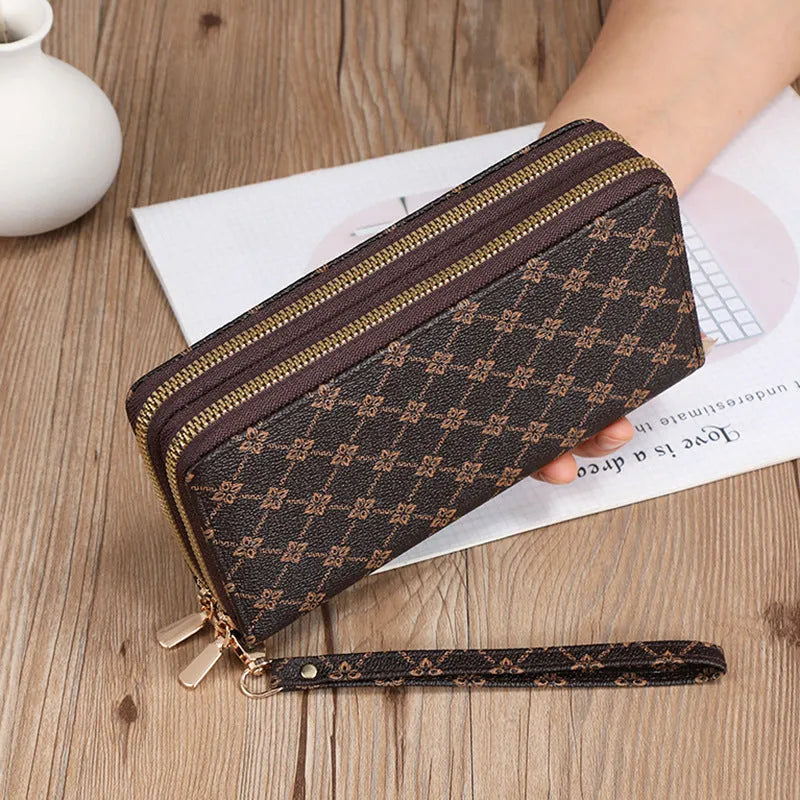 Long black PU leather wallet clutch with print detail showing mobile phone compartment and coin purse