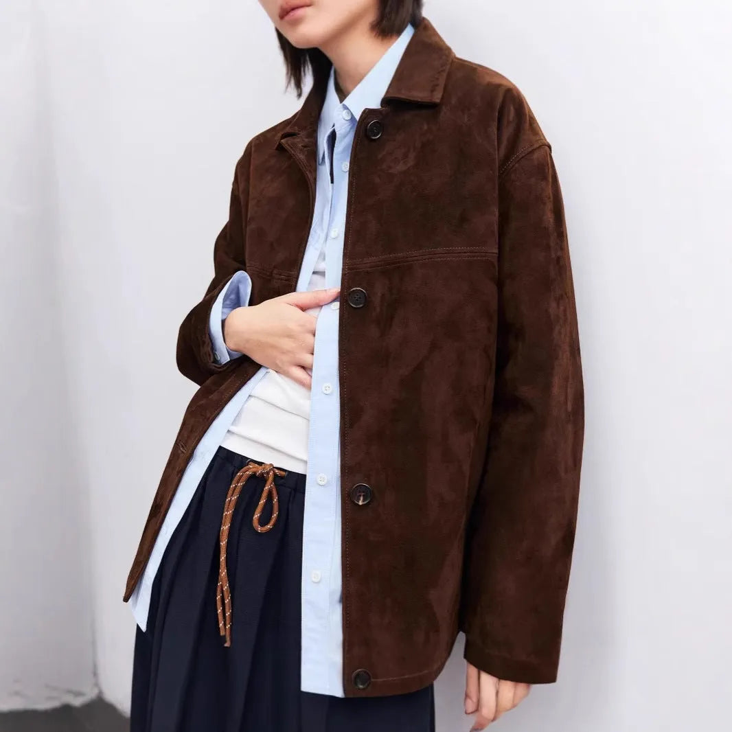 Women's caramel mocha cashmere blend retro coat with a Peter Pan collar and leather stitching.