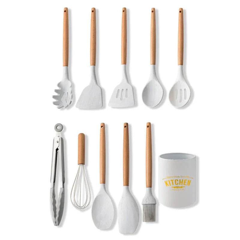 Elegant marbled silicone kitchenware set with wooden handle, perfect for cooking and baking.