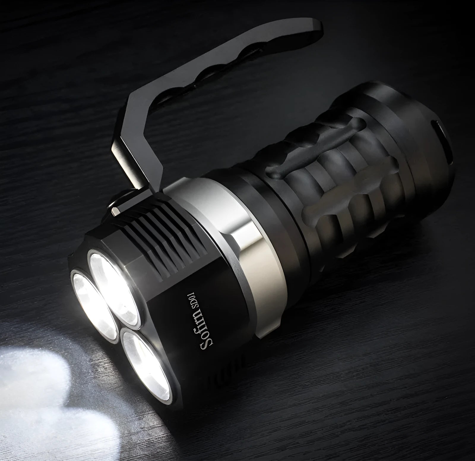 Aluminium alloy diving flashlight showing 18cm length, displayed with optional battery charger kit.