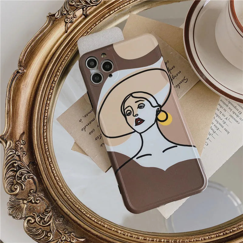 Orange yellow soft silicone iPhone case with a hand-drawn cartoon line painting design.