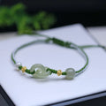 Natural Hetian jade woven bracelet with flexible wire construction and hollow out design