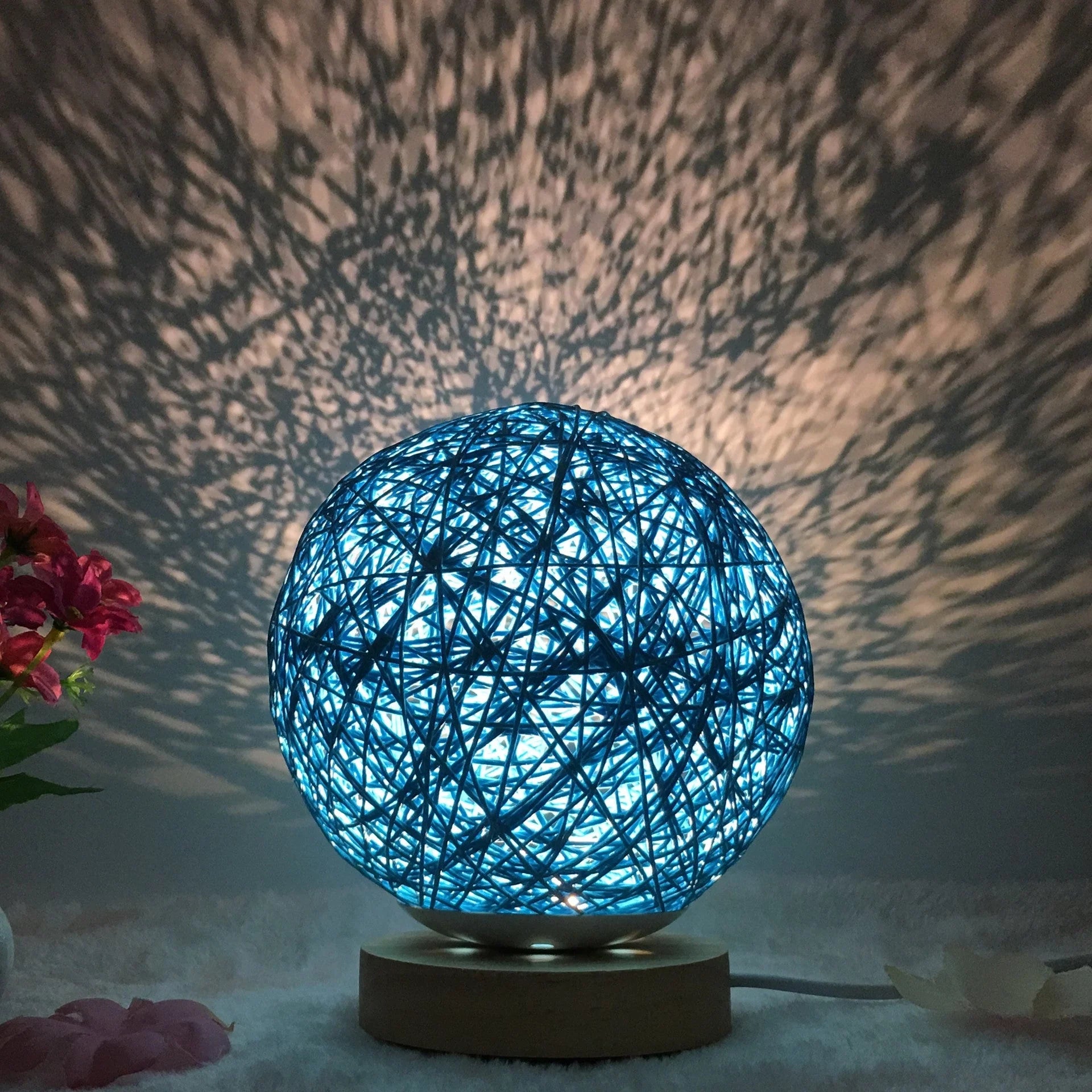 LED rattan table lamp with hand-knit lampshade in various colours