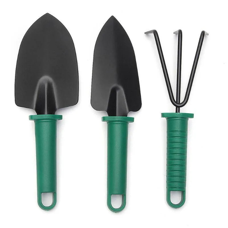 Camouflage 5 piece garden tool set with stainless steel shovel, rake, pruning shears, spray bottle, and plastic case in green and purple