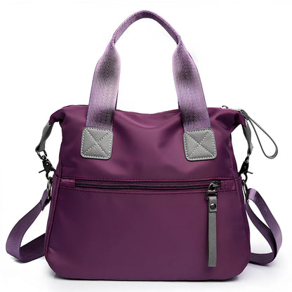 Ladies shoulder bag in black Oxford fabric, size M with multiple pockets and adjustable straps for handbag or crossbody carry, 340 mm width