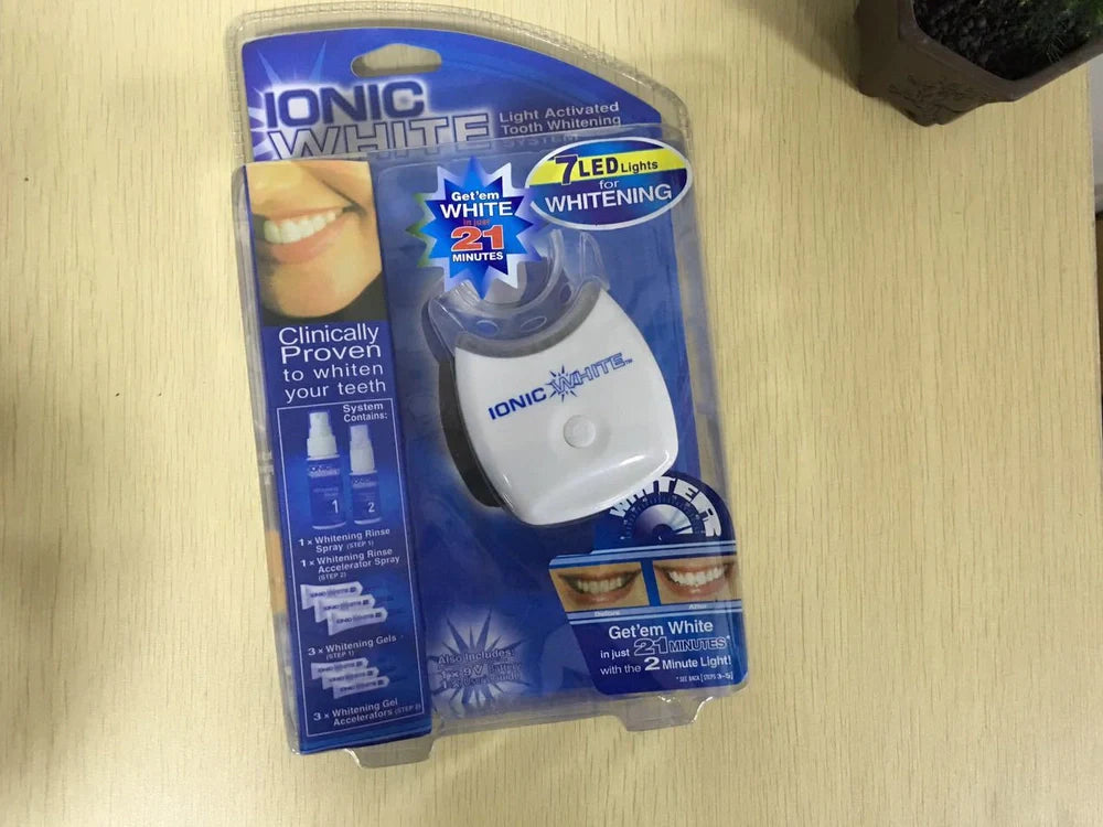 Cold light teeth whitening device with medical polymer construction for stain removal