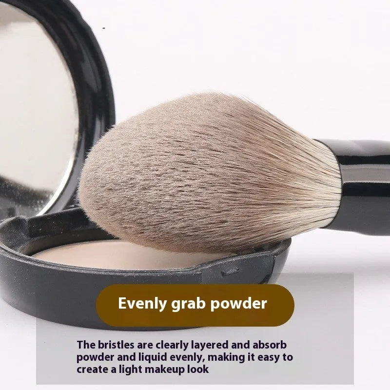 12-piece wooden handle makeup brush set with a powder brush in a grey PU pouch