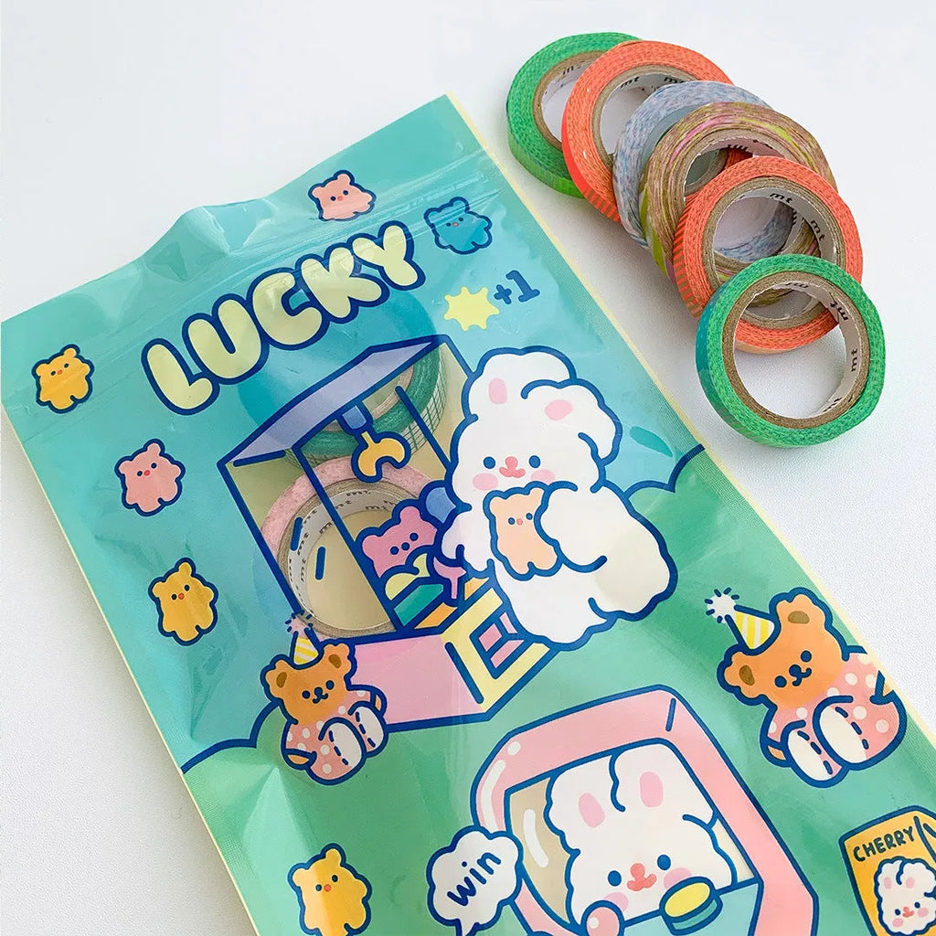 Green, blue, purple and pink rectangle packaging bags with cute rabbit designs for snacks and gifts.