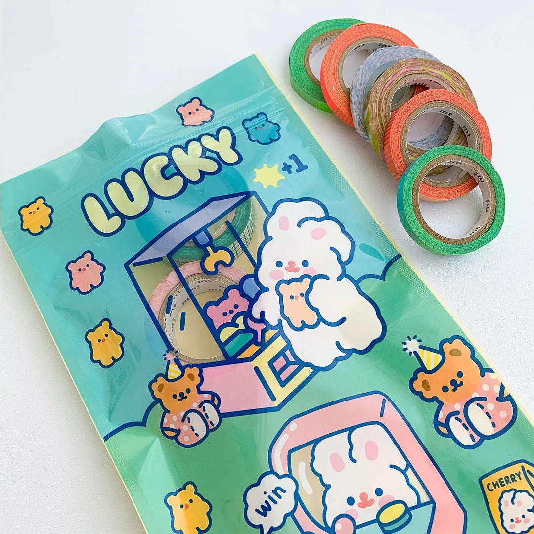 Green, blue, purple and pink rectangle packaging bags with cute rabbit designs for snacks and gifts.