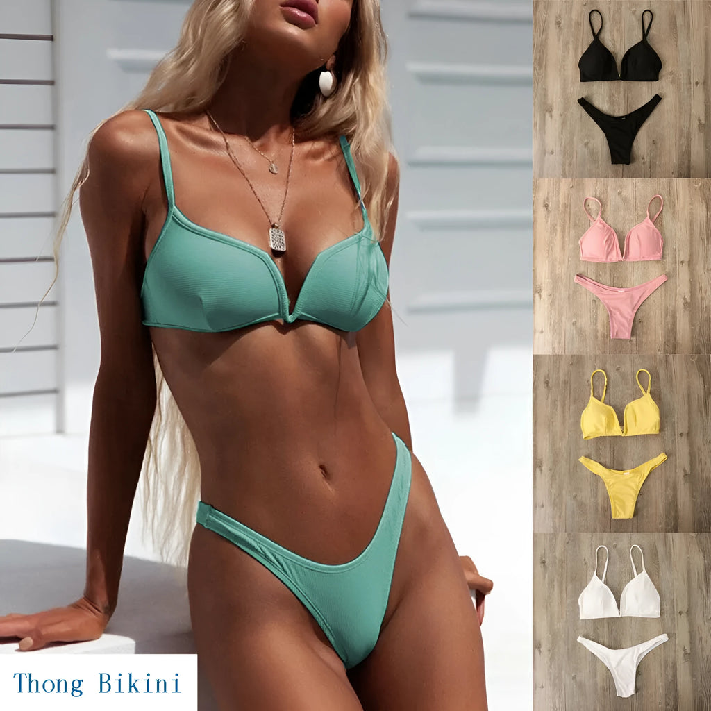 Women's low-waist thong bikini bottom in polyester, available in black, blue, pink, and white, sizes S to L
