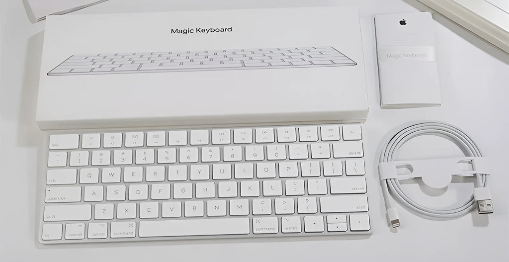 White Apple G6 ultra-thin metal Bluetooth wireless keyboard on a desk