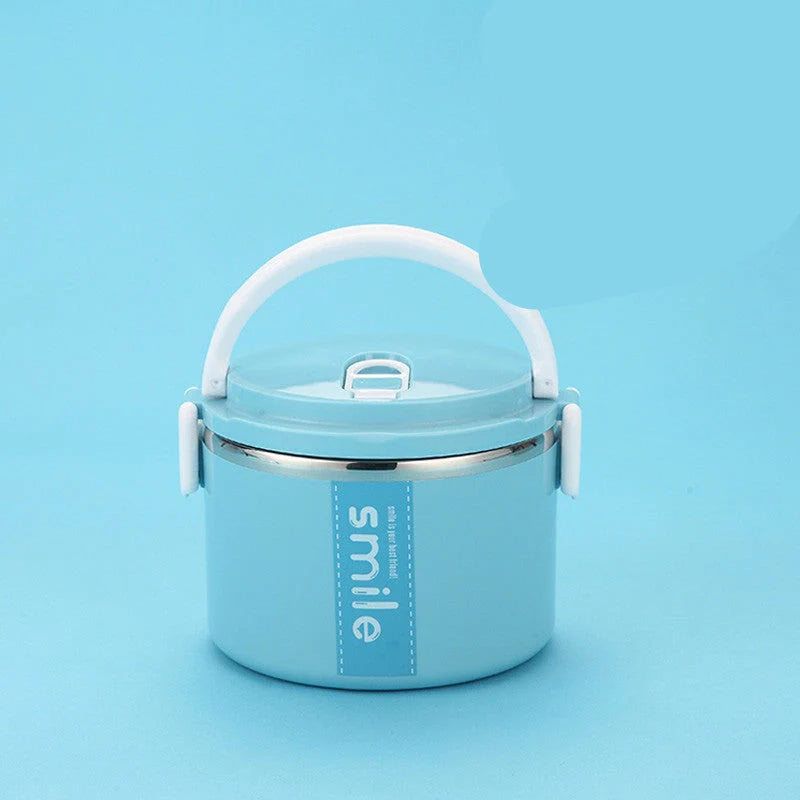 Stainless steel lunch box with built-in spoon, leak-proof design, in green, pink, and blue