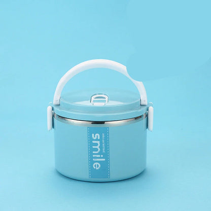 Stainless steel lunch box with built-in spoon, leak-proof design, in green, pink, and blue
