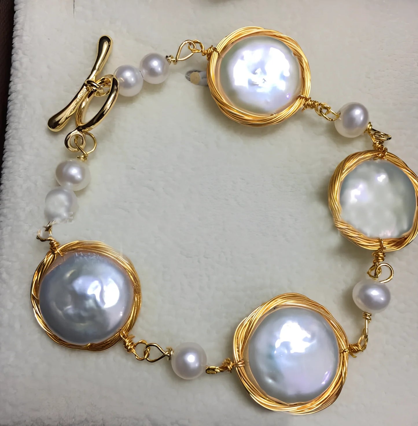 14K gold bracelet with 14mm white button freshwater pearls and baroque texture