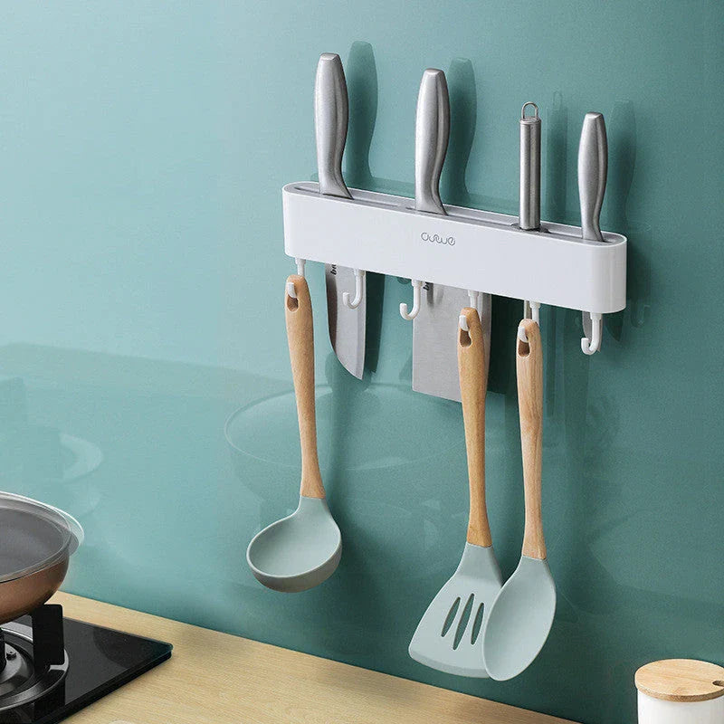 Wall-mounted knife holder in grey and black, holding 4 knives and 6 utensils