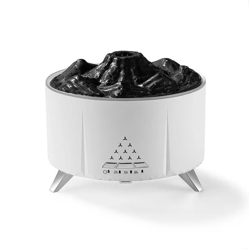 White portable simulated flame ultrasonic aromatherapy air humidifier with remote control on a table
